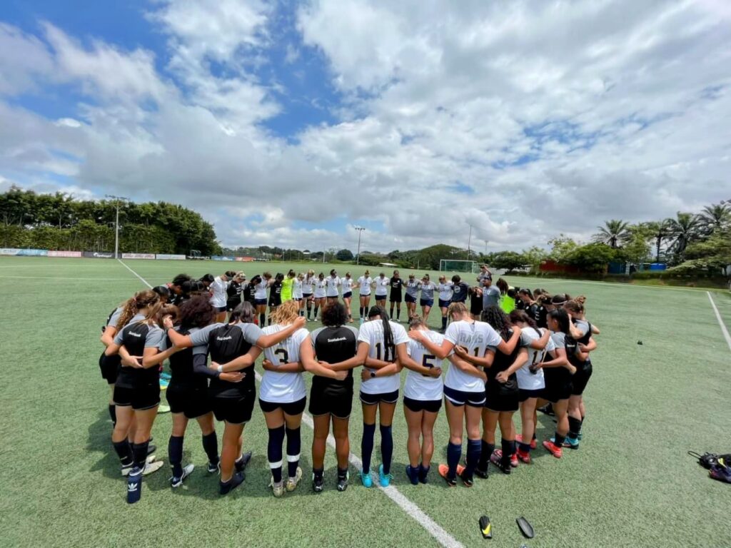 Costa Rican team praying before a game