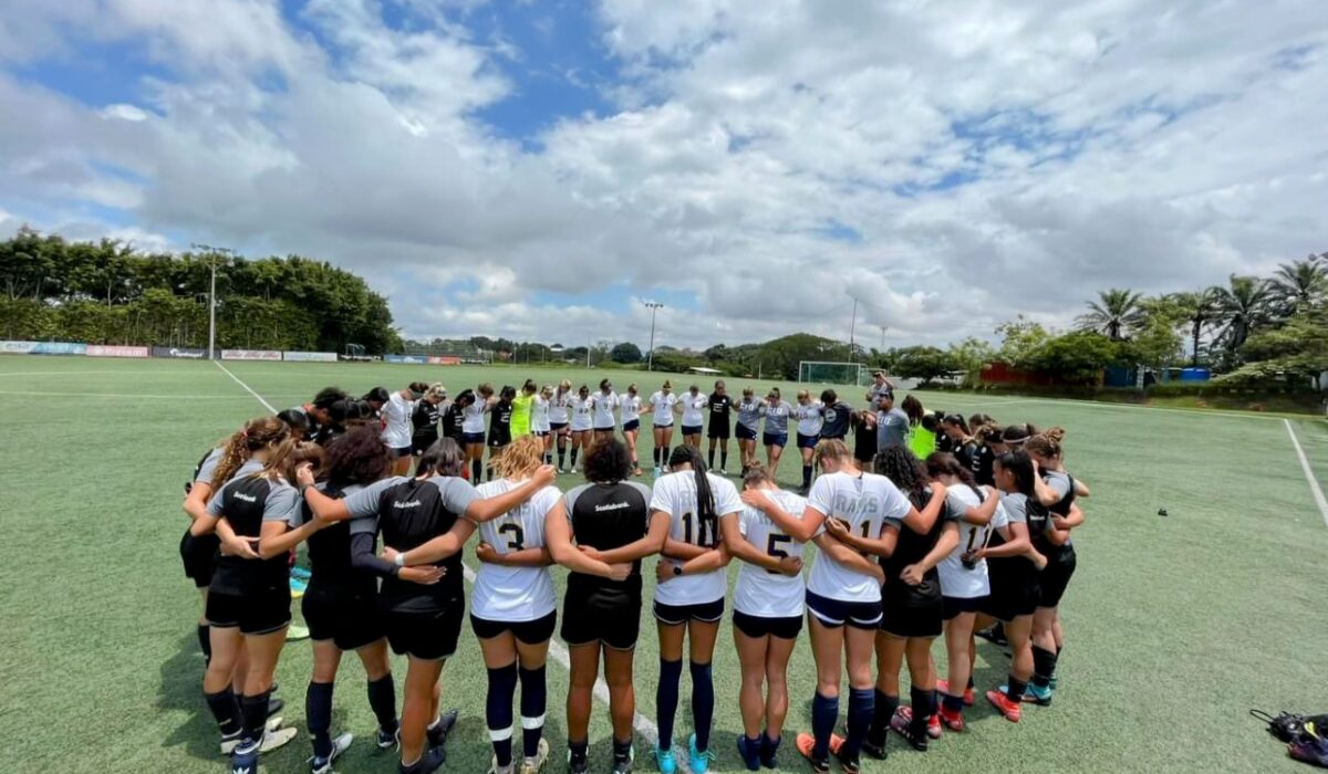 Costa Rican team praying before a game